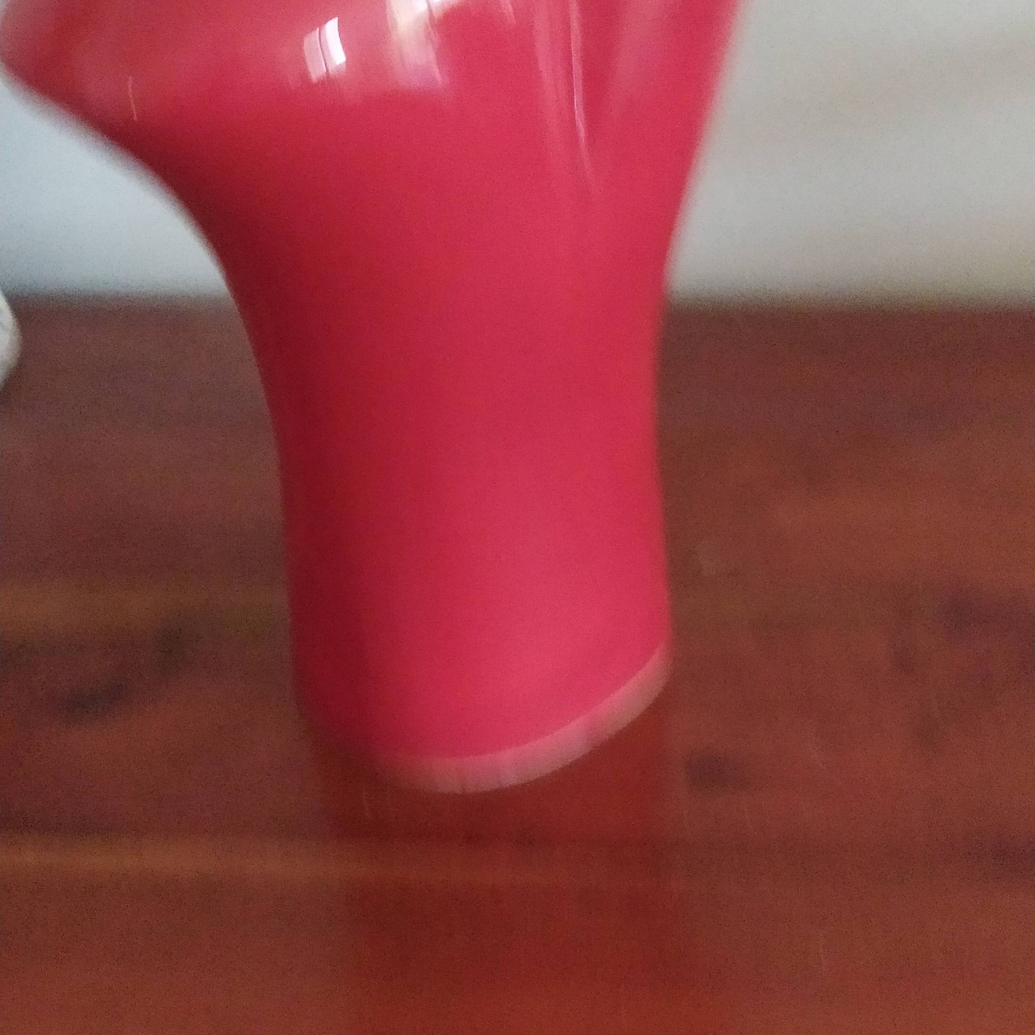 red ceramic designer vase by Les Grottes de Dieulefit