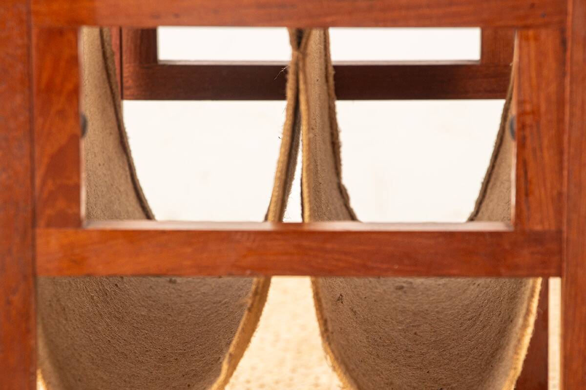 Danish magazine rack in teak and linen by Henning Wind-Hansen for Sika Møbler