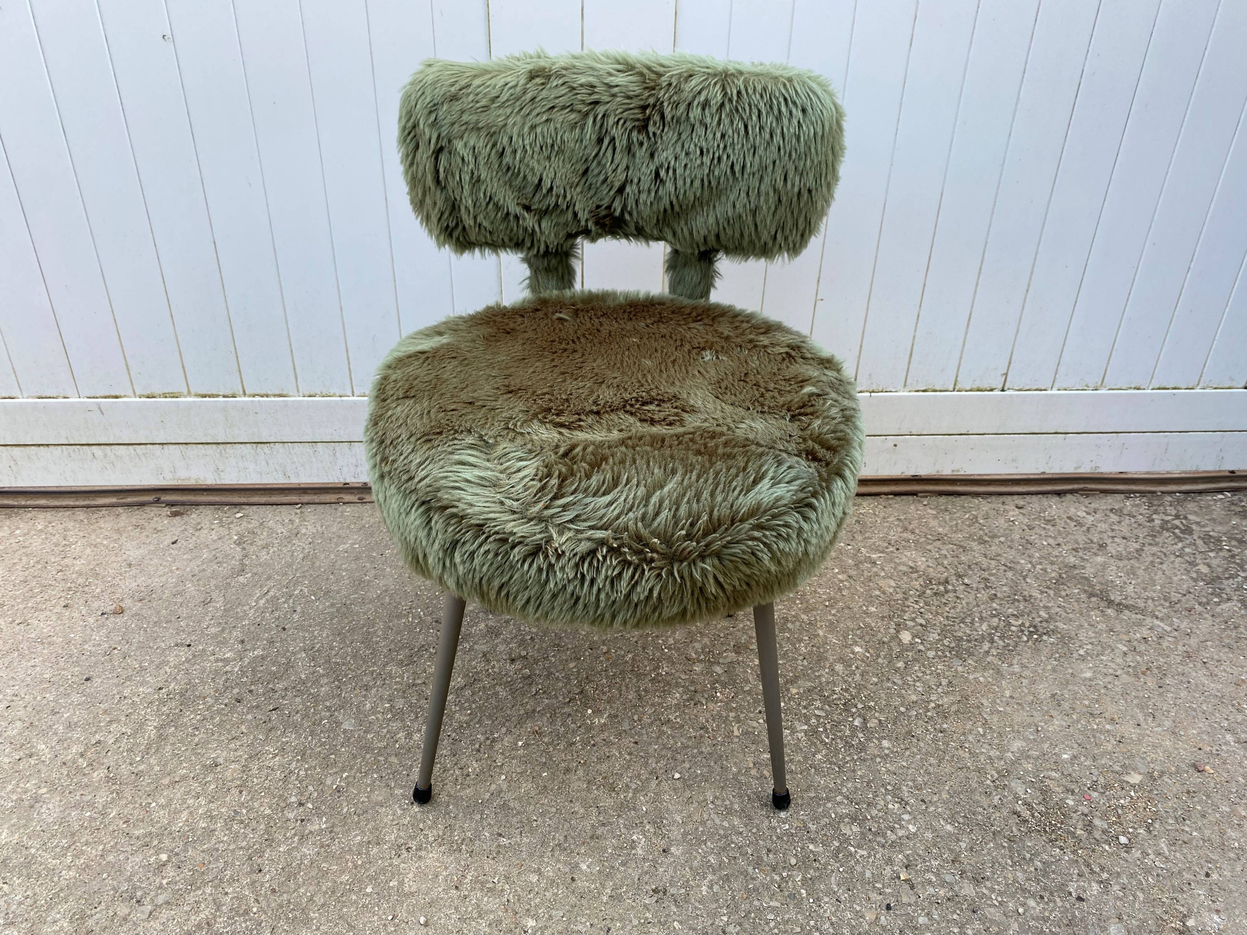 Vintage green furry chair from the 1960s