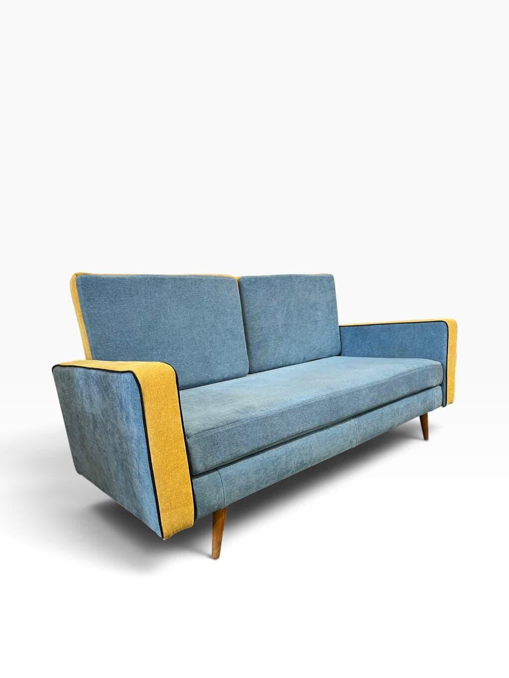 Vintage blue armchair/daybed/sofa bed with yellow accents.