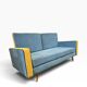 Vintage blue armchair/daybed/sofa bed with yellow accents.