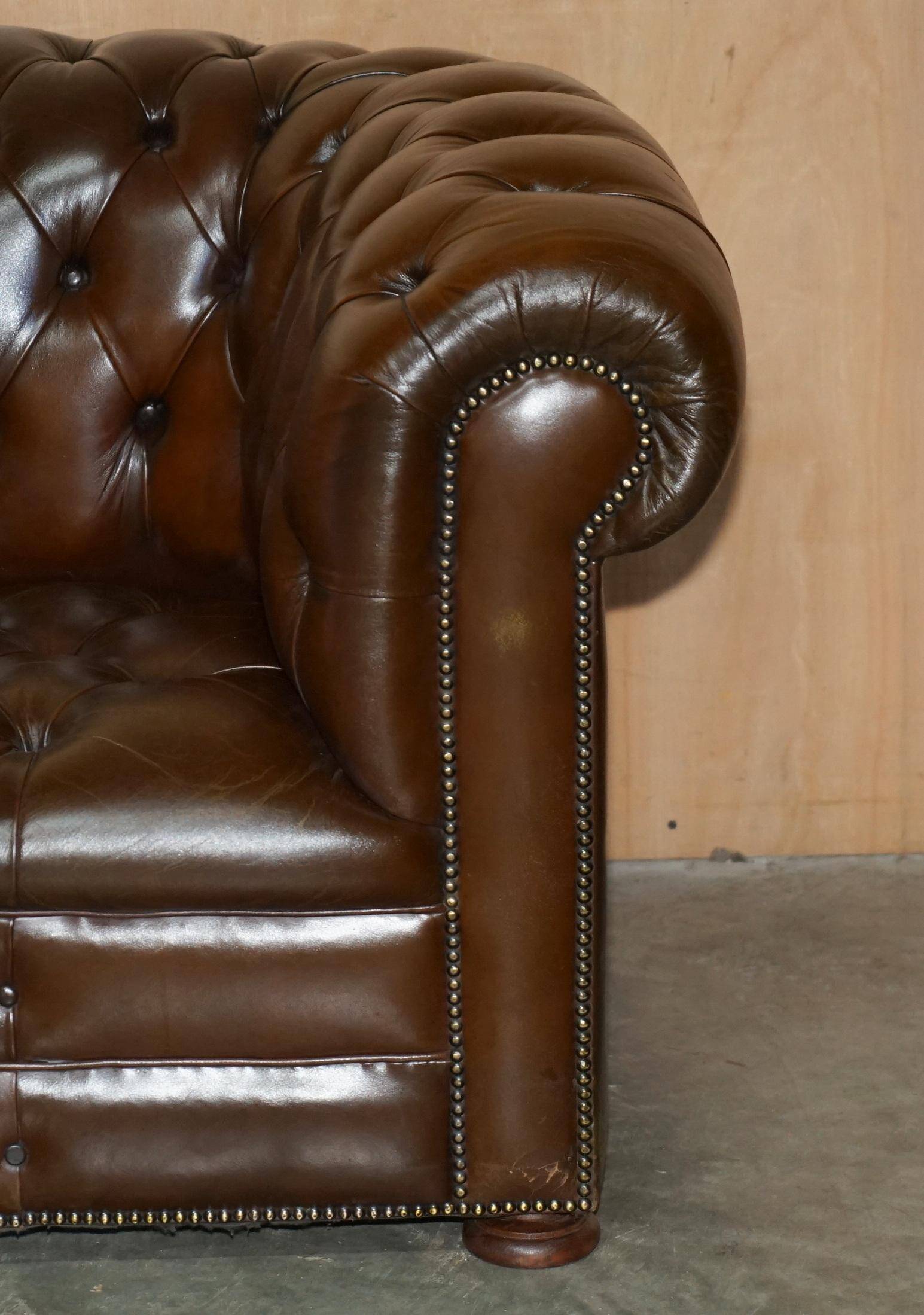 Restored Chesterfield leather sofa in vintage Art Deco style