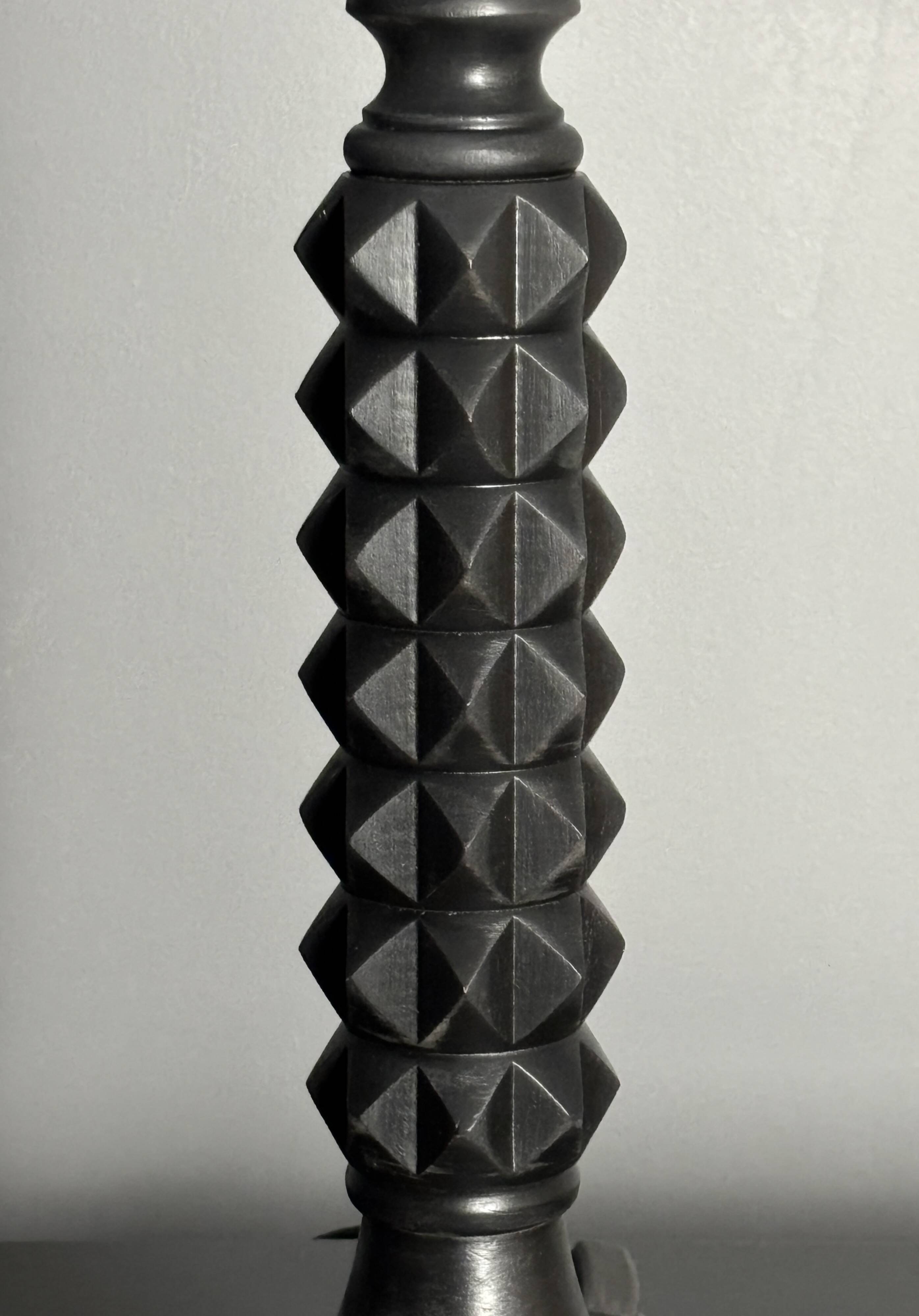 Brutalist wood turned ebonized table lamp in the style of Charles Dudouyt