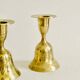 Pair of brass "bell" candle holders