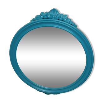 Miroir peint en bleu paon