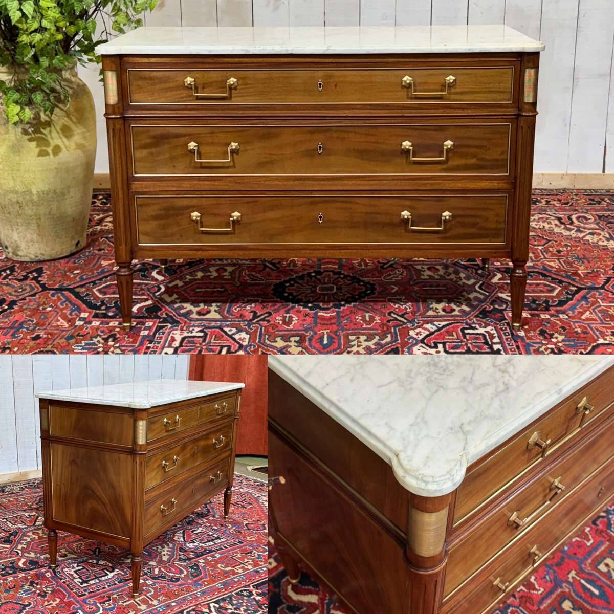 Louis XVI commode in mahogany with a marble top from the 1950s.