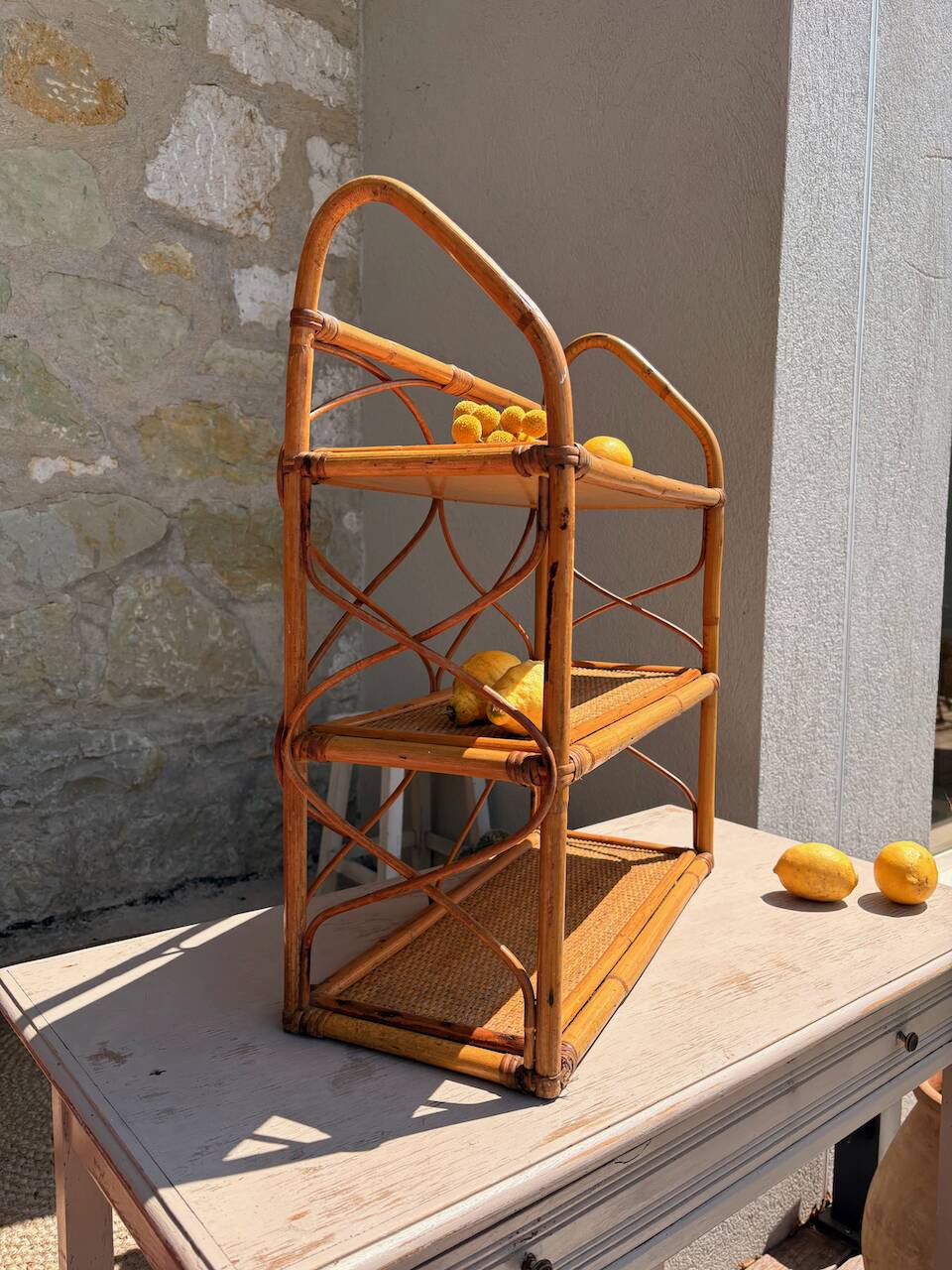 Vintage wall shelf in rattan