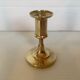 Trio of brass candle holders