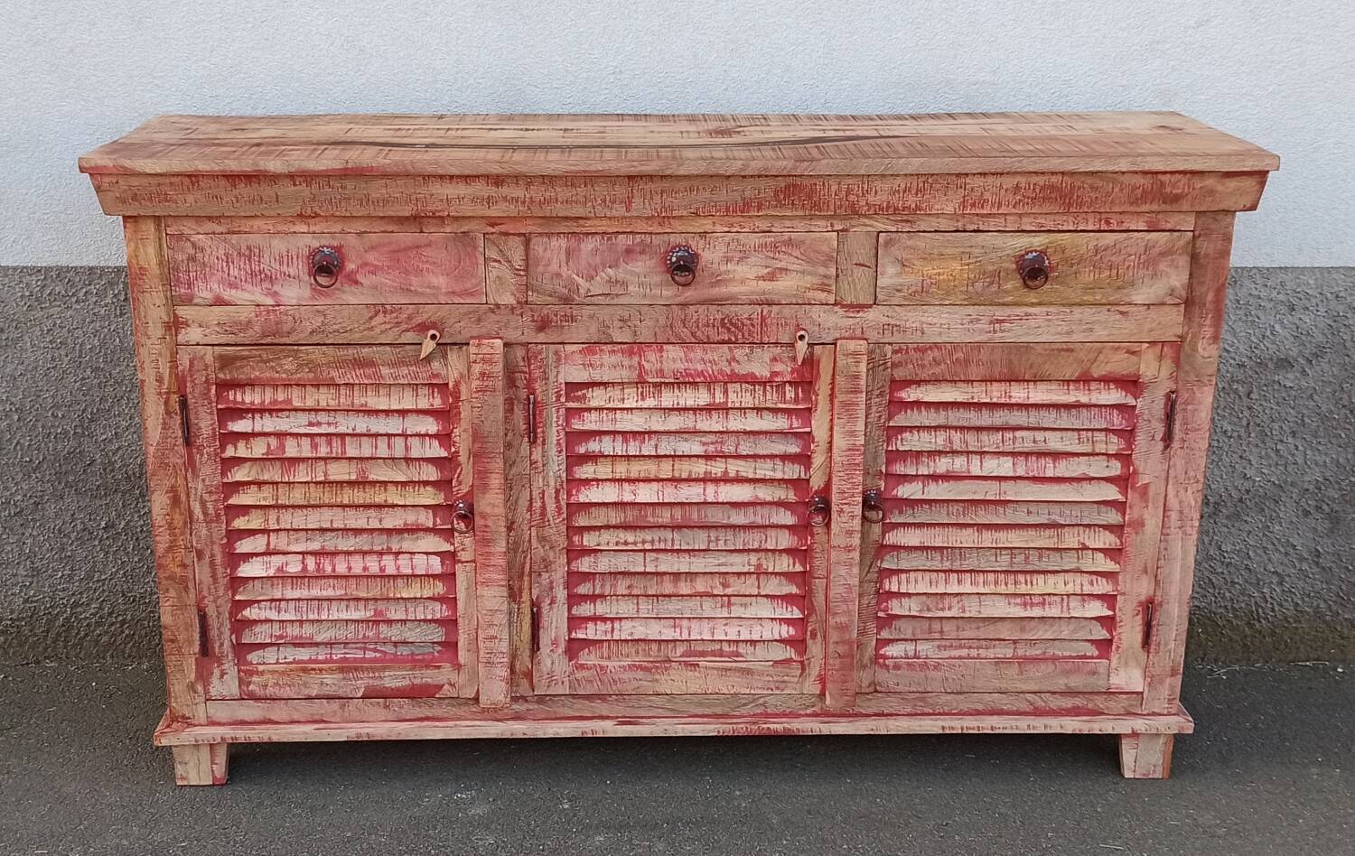 Wooden sideboard with red highlights