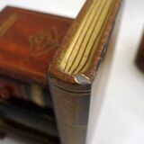 Pair of bookends (& secret boxes) in trompe l'oeil Stacked books