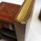 Pair of bookends (& secret boxes) in trompe l'oeil Stacked books
