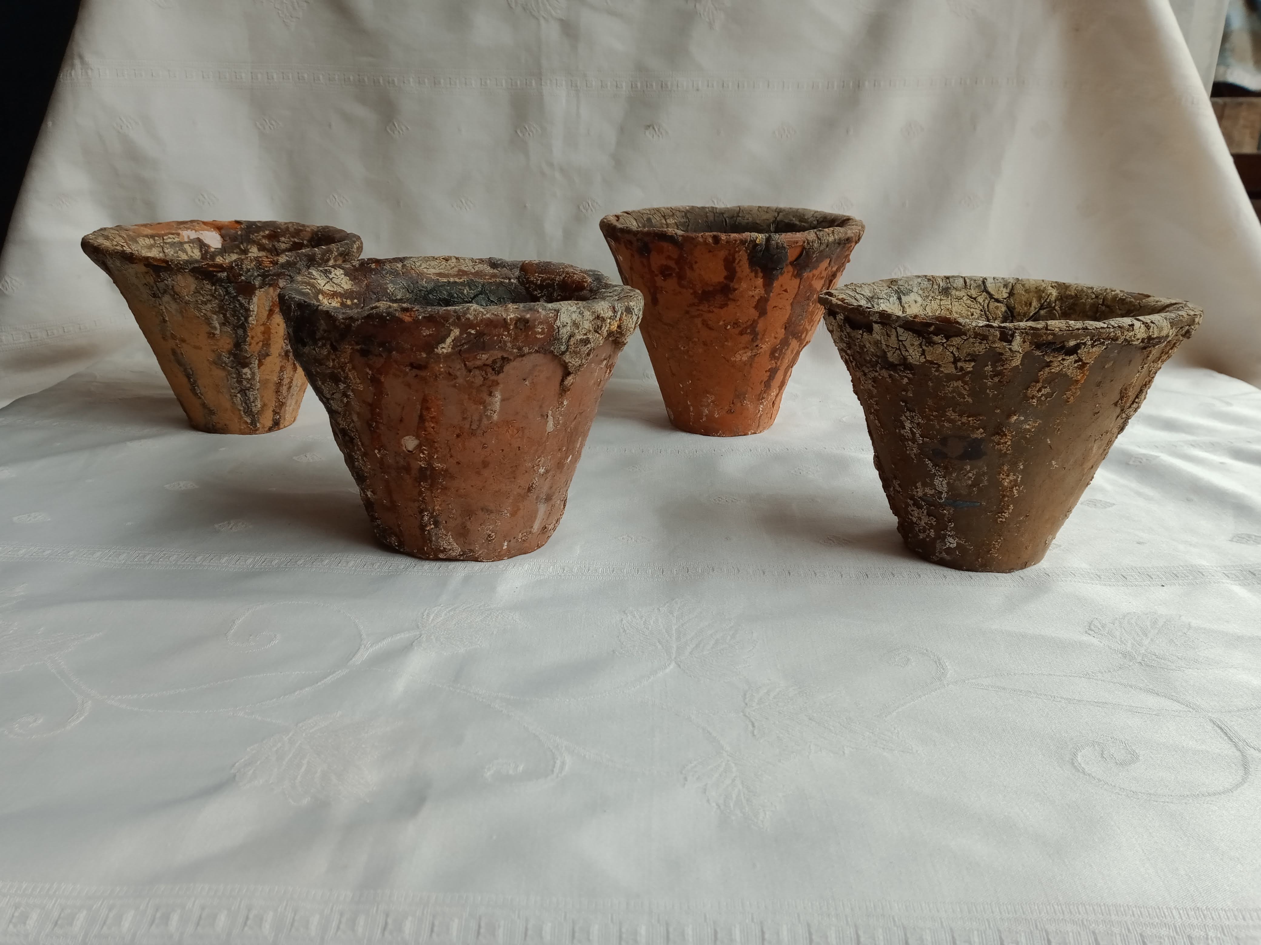 Old terracotta sap pots