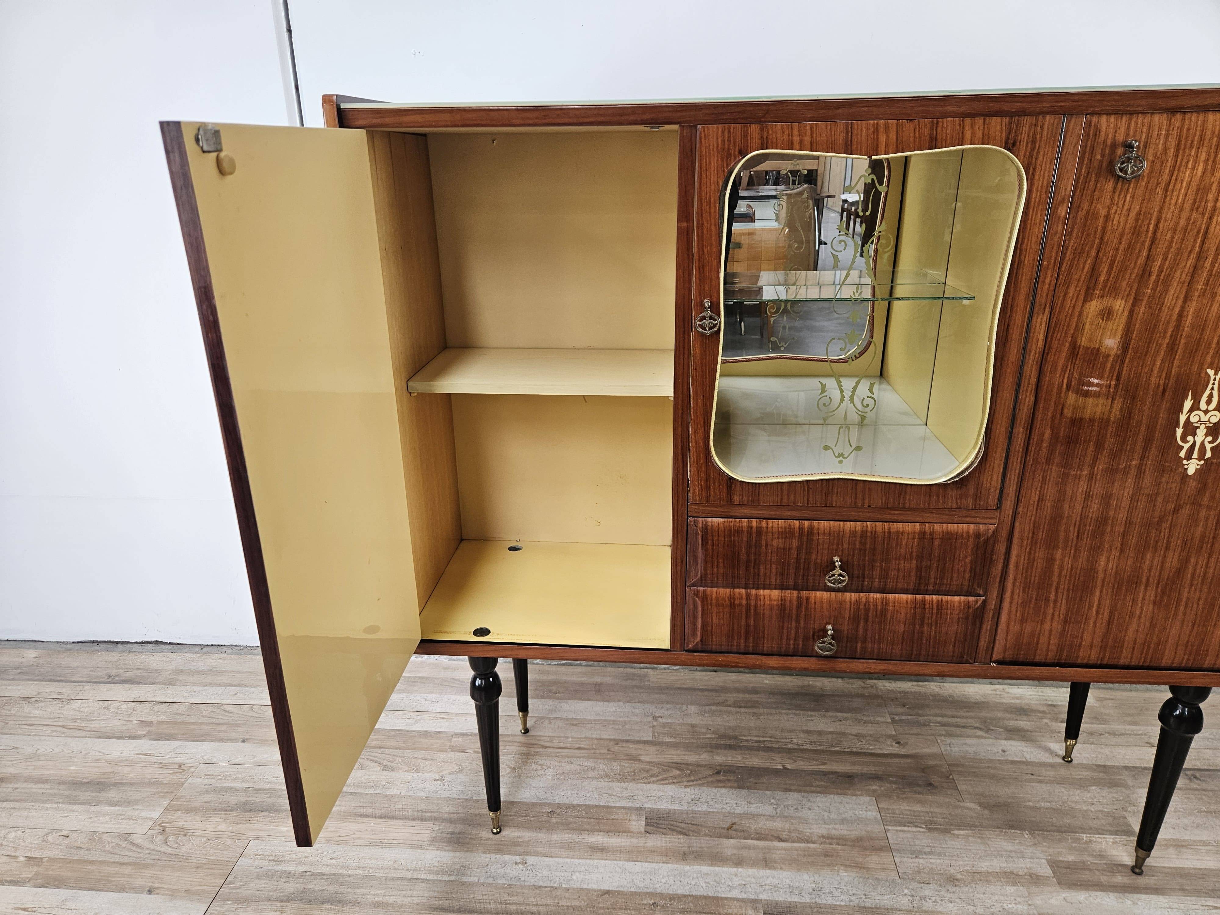 Mid-century 1960s mahogany showcase with glass top