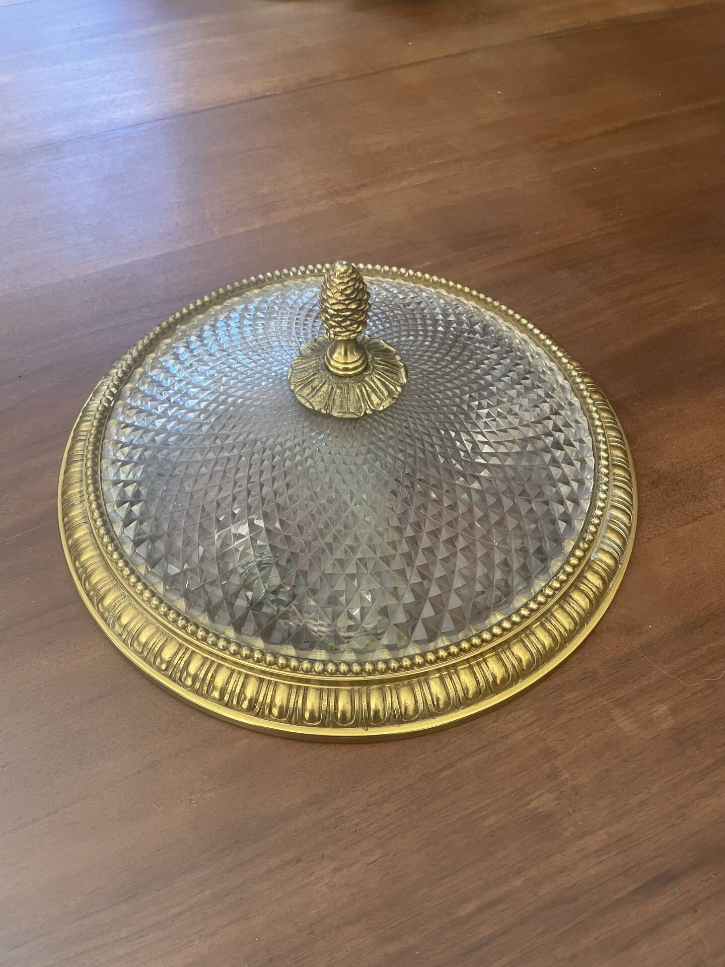 Antique ceiling light in bronze and cut crystal with diamond points.