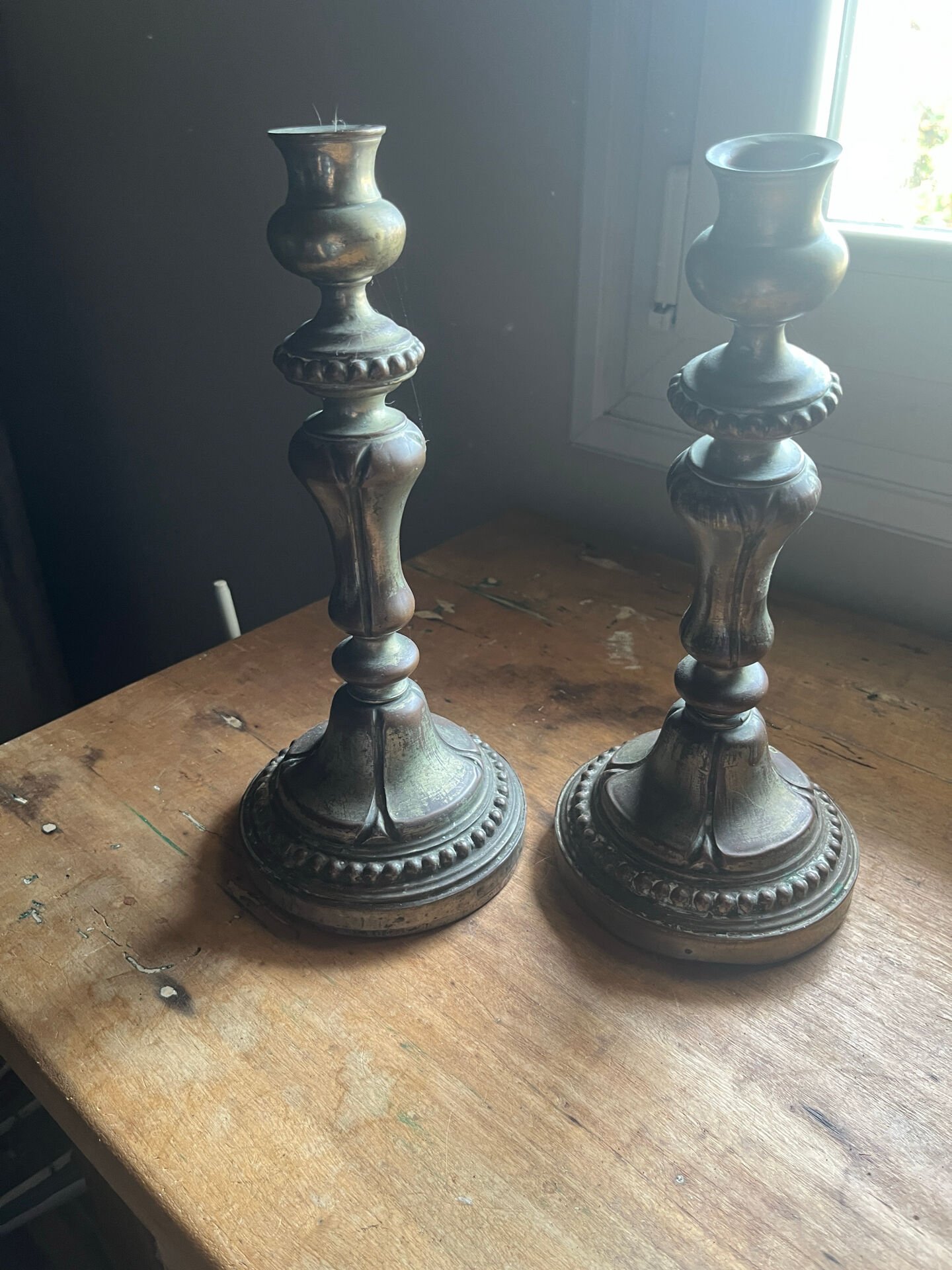 2 antique silver candlesticks