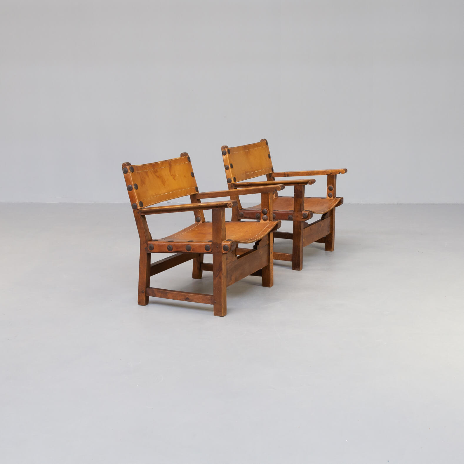 50s oak brutalist spanish chair with saddle leather