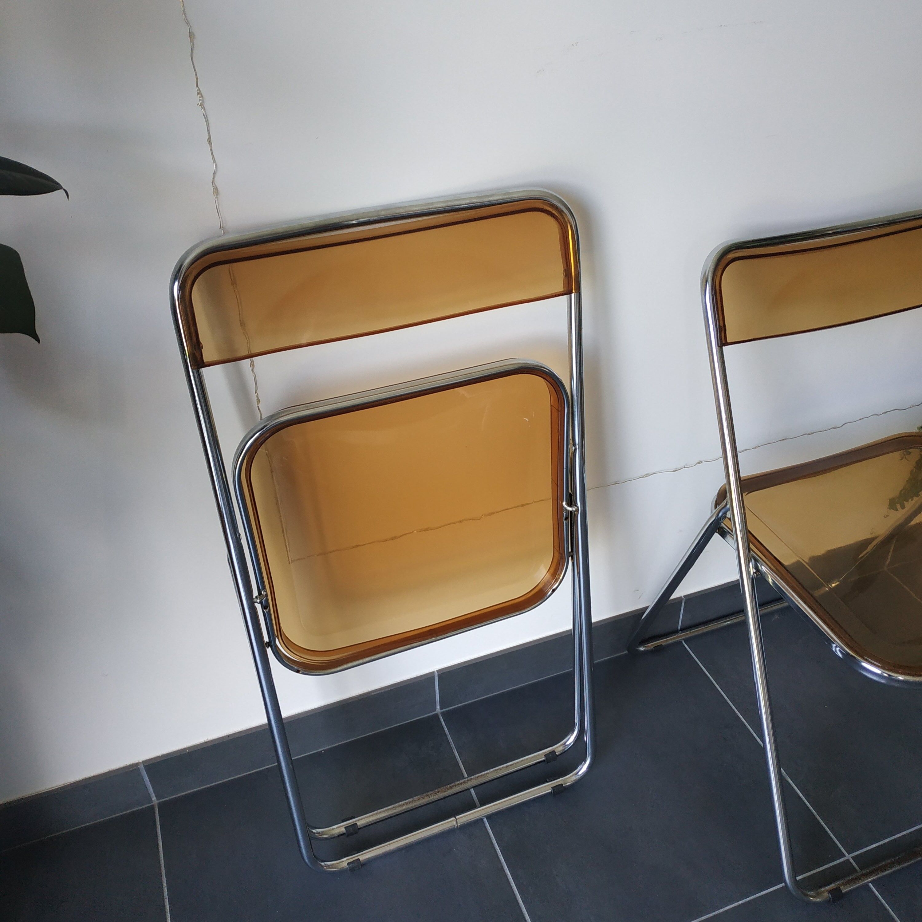 Seventies stainless steel and caramel chairs
