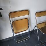 Seventies stainless steel and caramel chairs