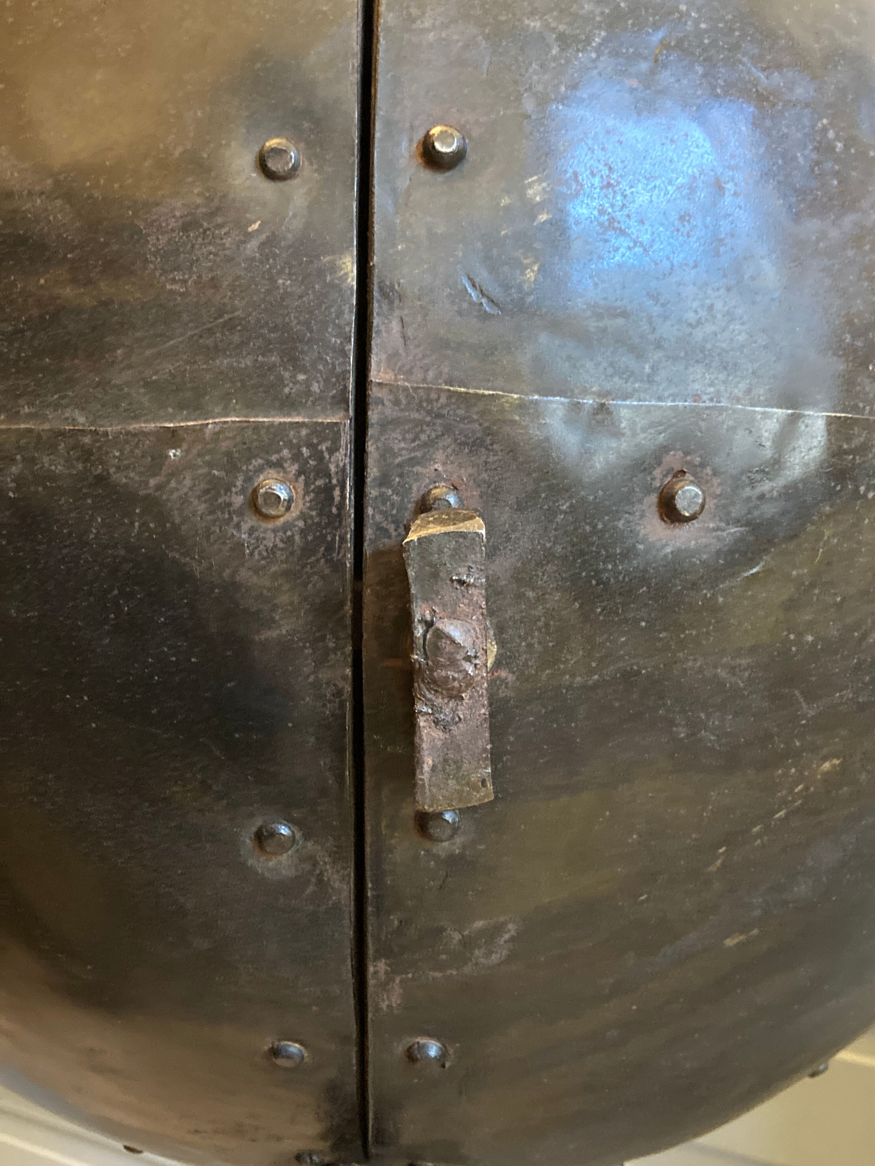 Atypical industrial furniture riveted sphere