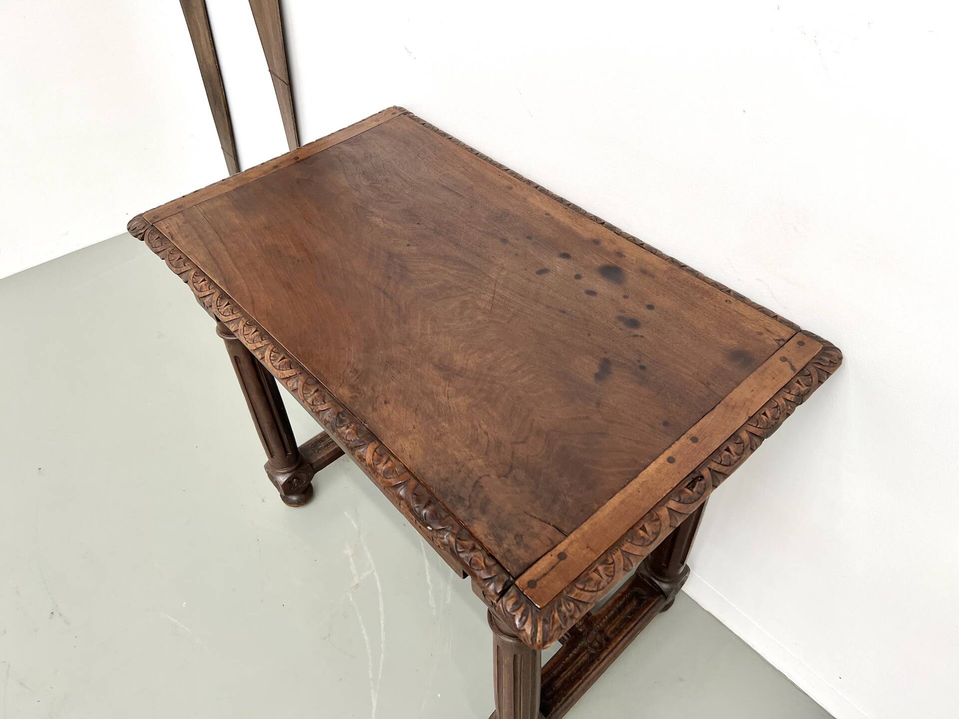 Small carved oak writing table, 19th century