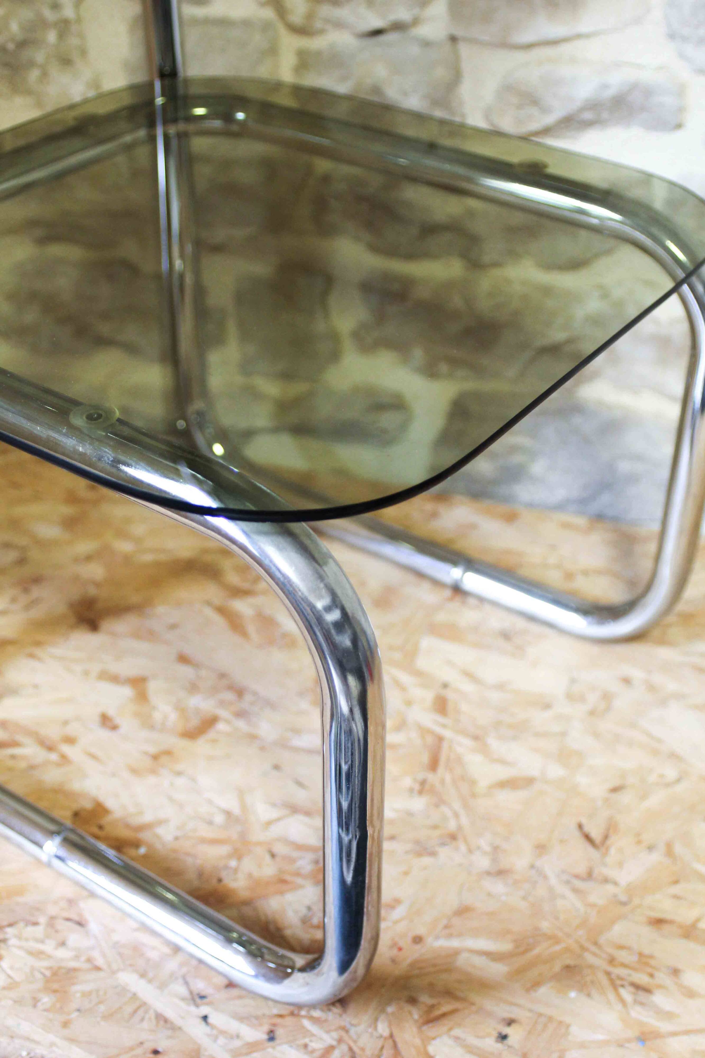 Chrome metal and smoked glass side table.