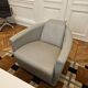 Two-seater sofa and a grey leather armchair Italia.