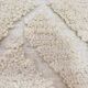 Tapis artisanal en laine naturelle