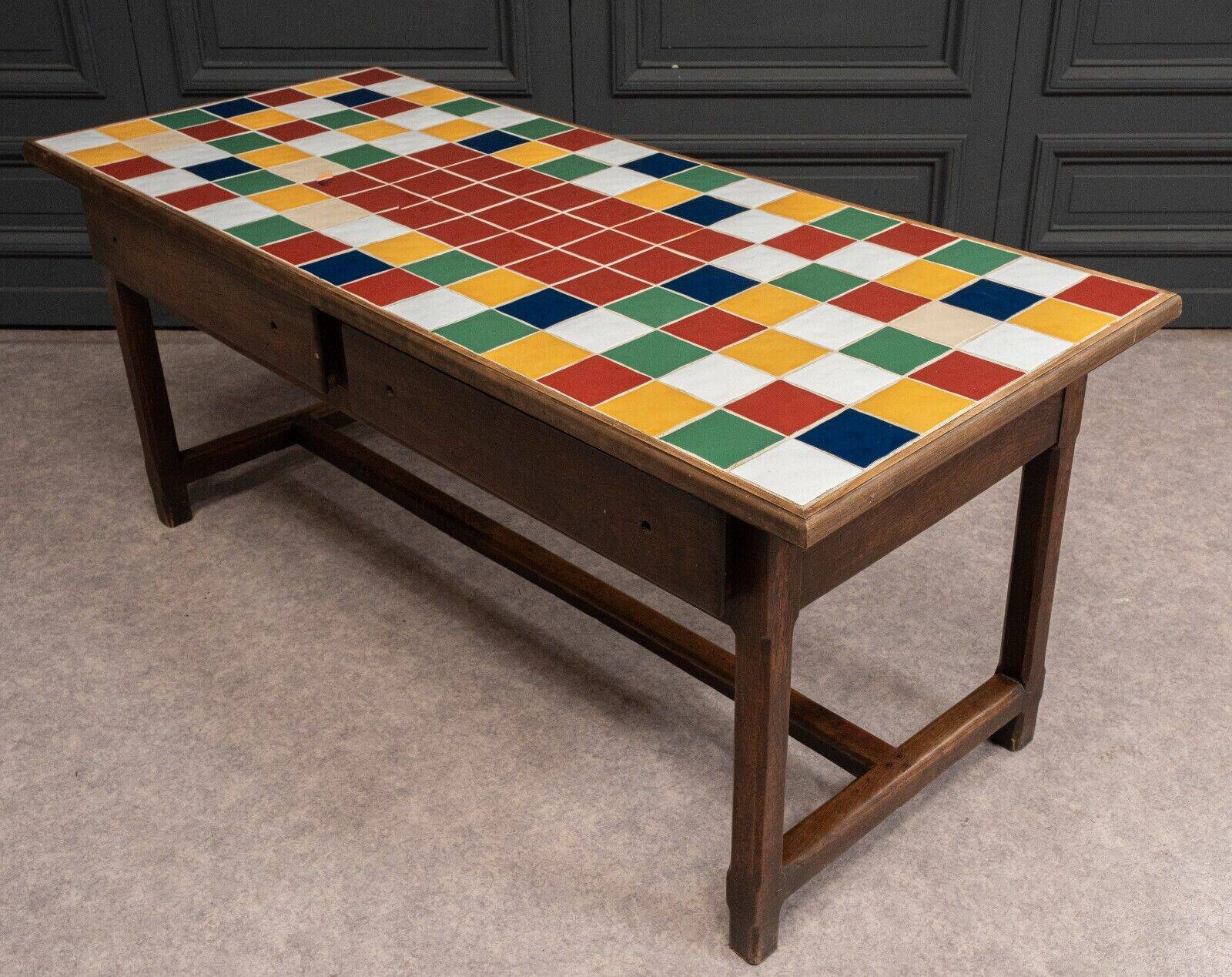 19th century oak farm table with multi-colored ceramic tiles