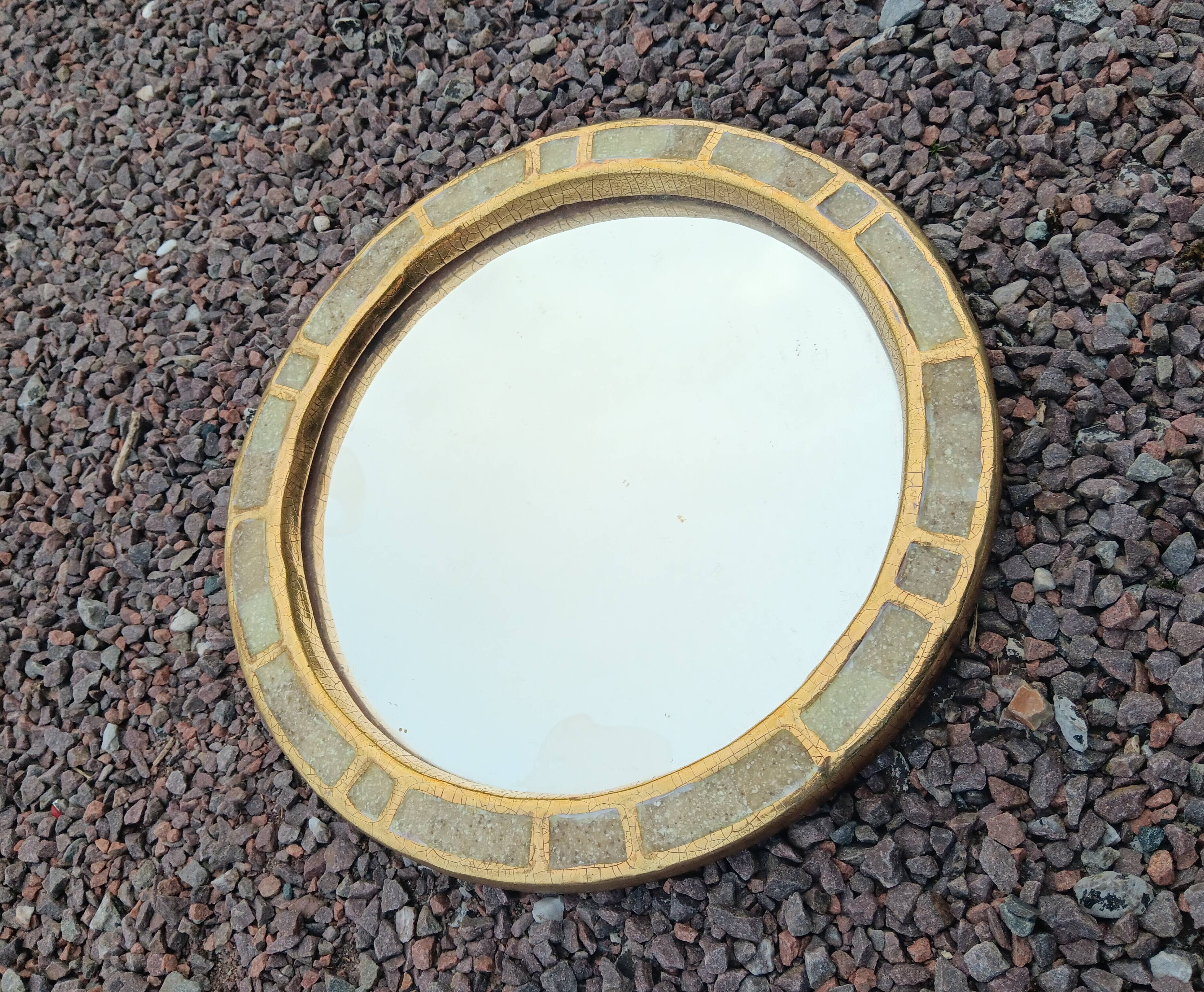 Ceramic mirror "gears" by Mithé Espelt