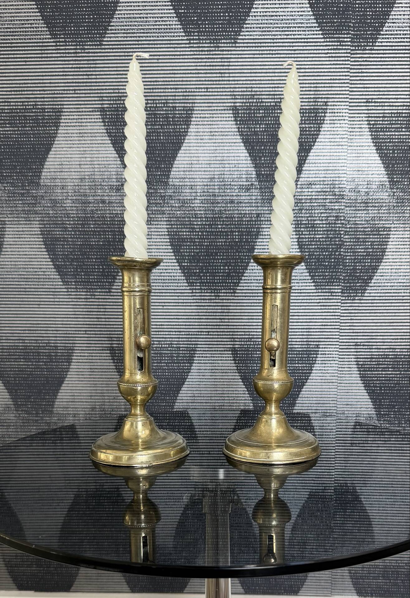 Pair of brass push candle holders – Late 19th century