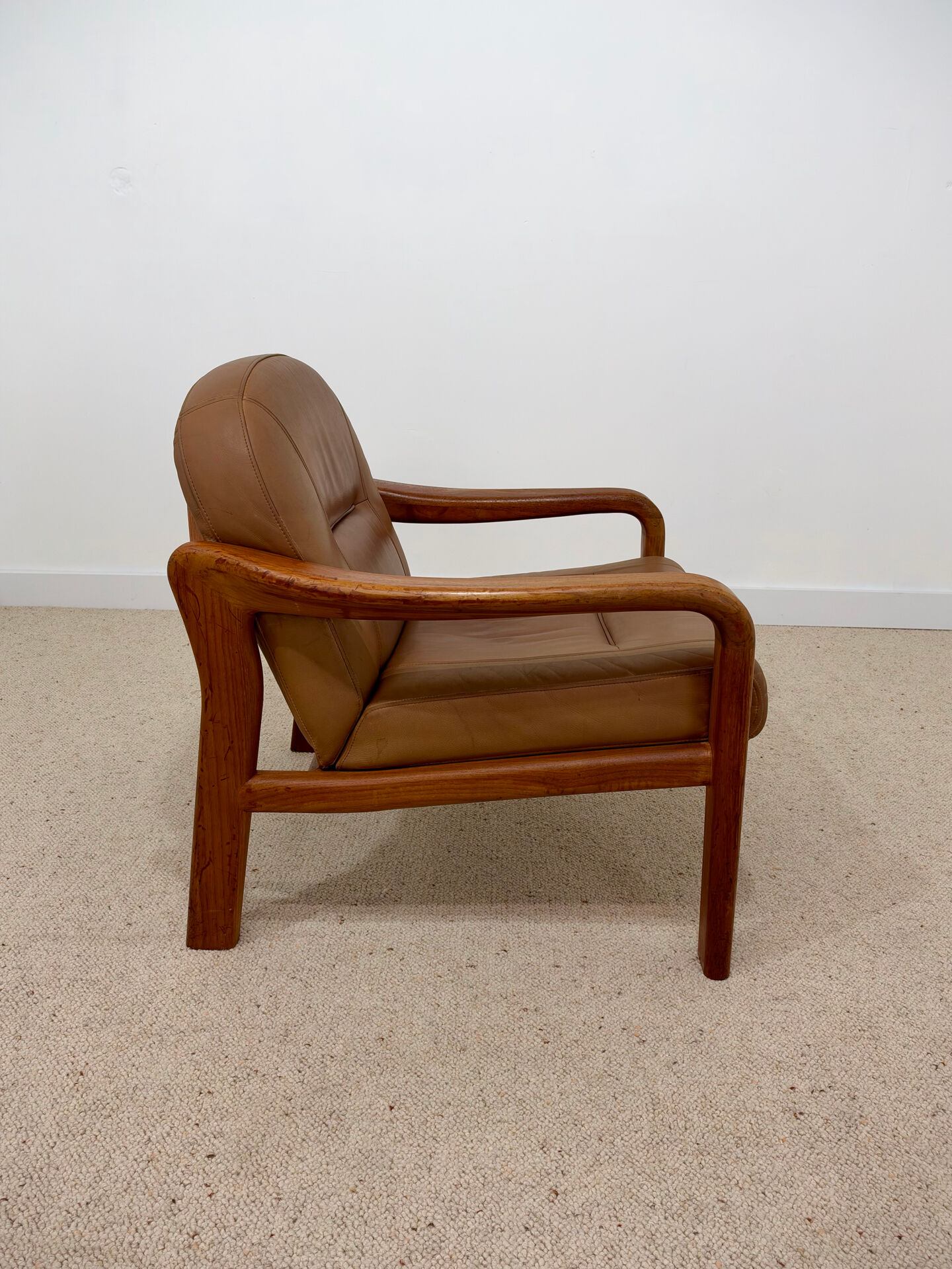 Vintage leather and wood armchair – 1970s