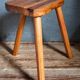 Solid wood tripod stool from the 50s