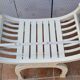 Curule stool in patinated carved wood, Manuel Canovas seat, 60 cm
