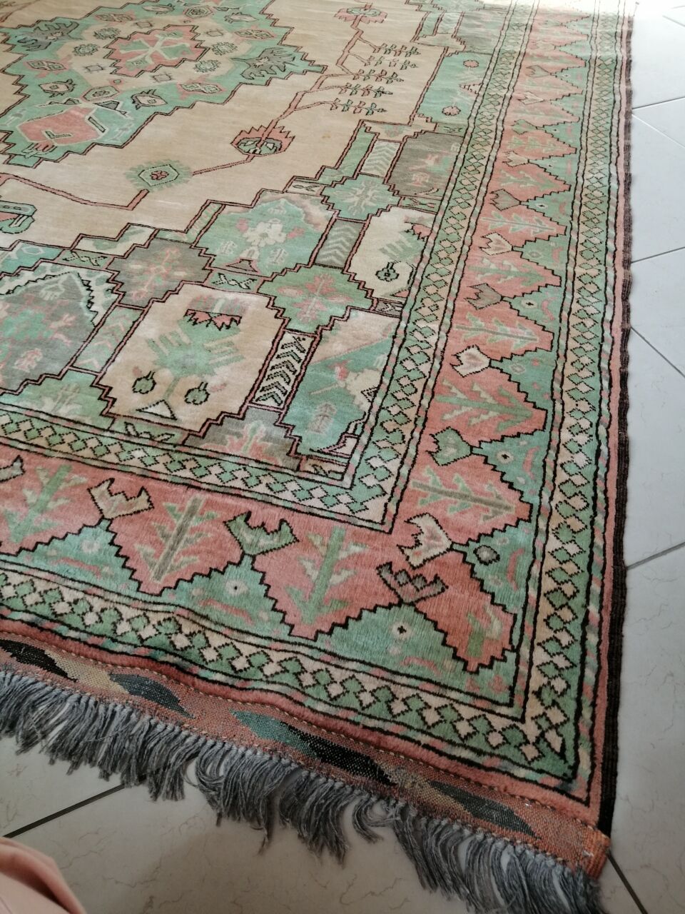 Afghan rug in pastel colors