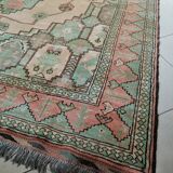 Afghan rug in pastel colors