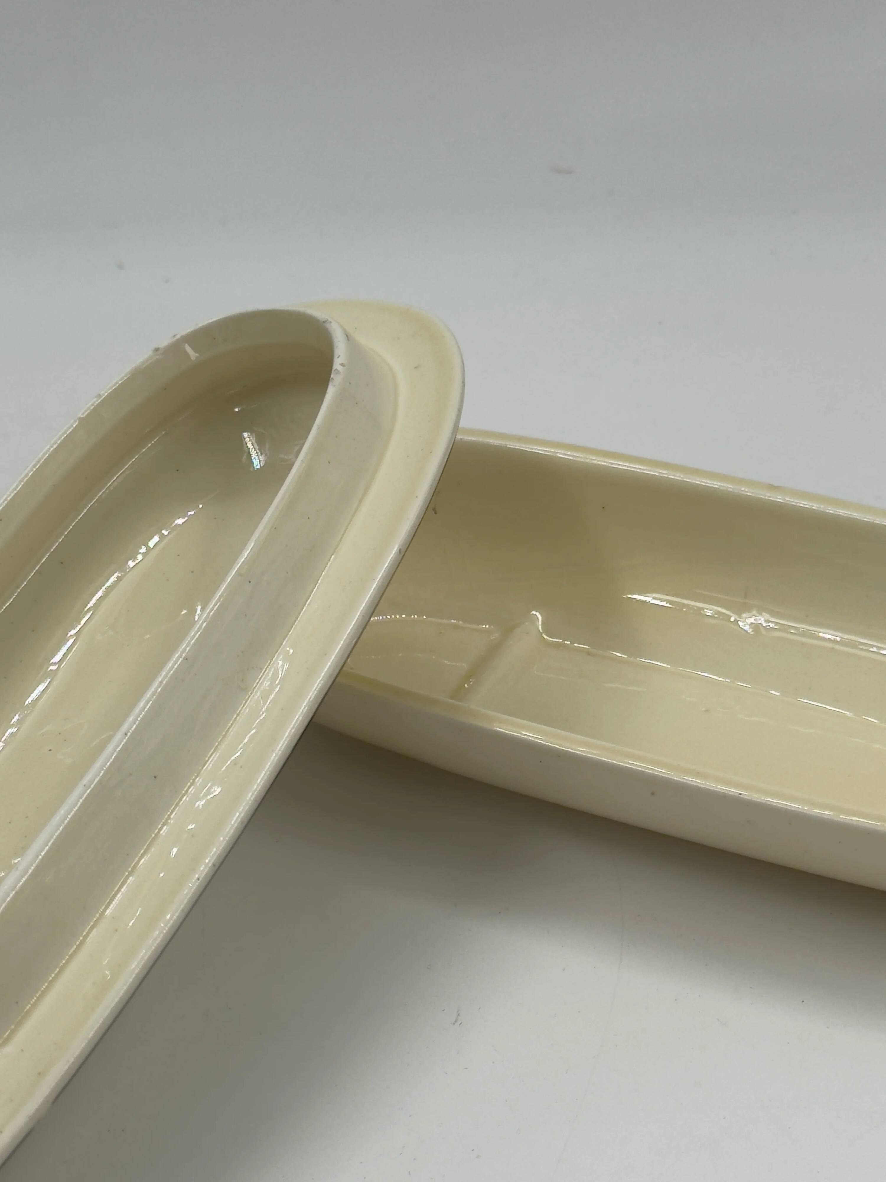 Vintage Art Deco butter dish in ivory ceramic with platinum stripes.