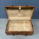 Antique brown travel case with wooden slides from the early 1900s
