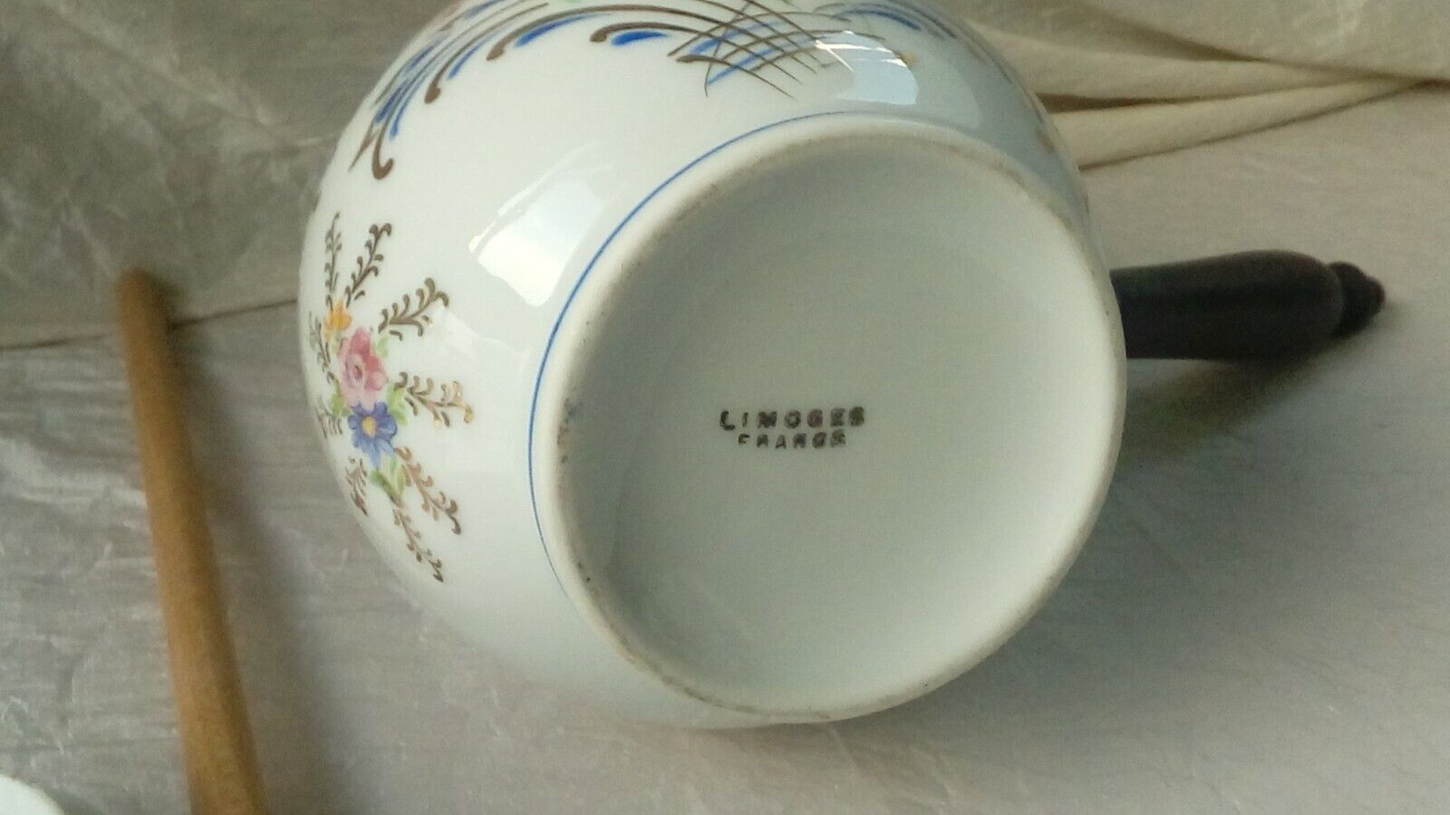 Limoges porcelain chocolatiere with its moussoir