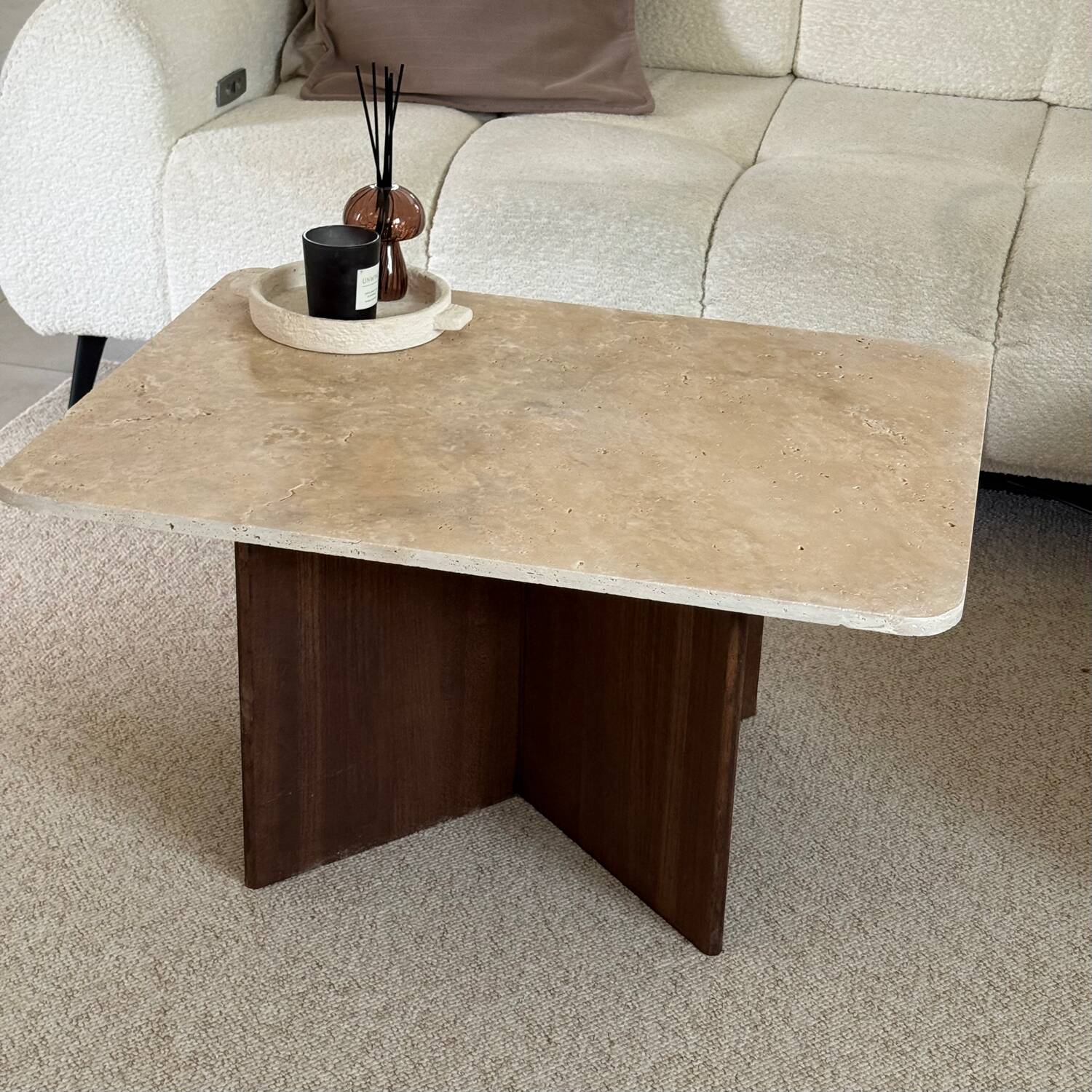 Rectangular coffee table in travertine and dark oak.