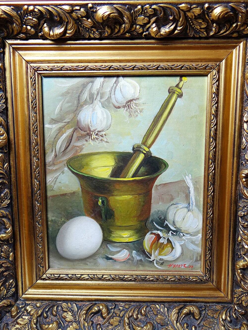 Still life with garlic, egg, and mortar signed Sarpe, 1979, oil on canvas.