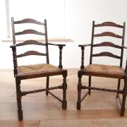 Pair of English oak armchairs with ladder back and rush seats