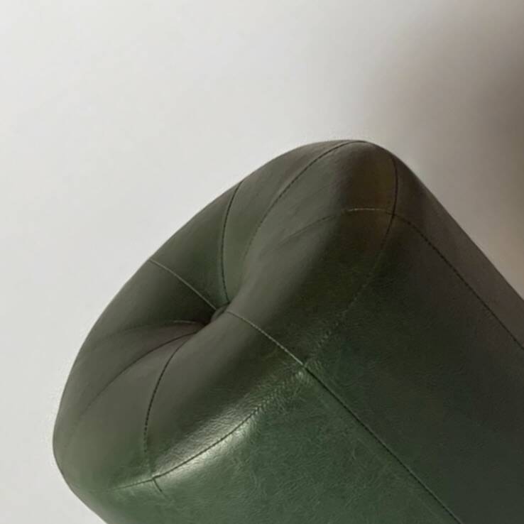 Pouf vintage rond en Skaï vert