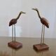 Pair of teak and brass herons from the 70s