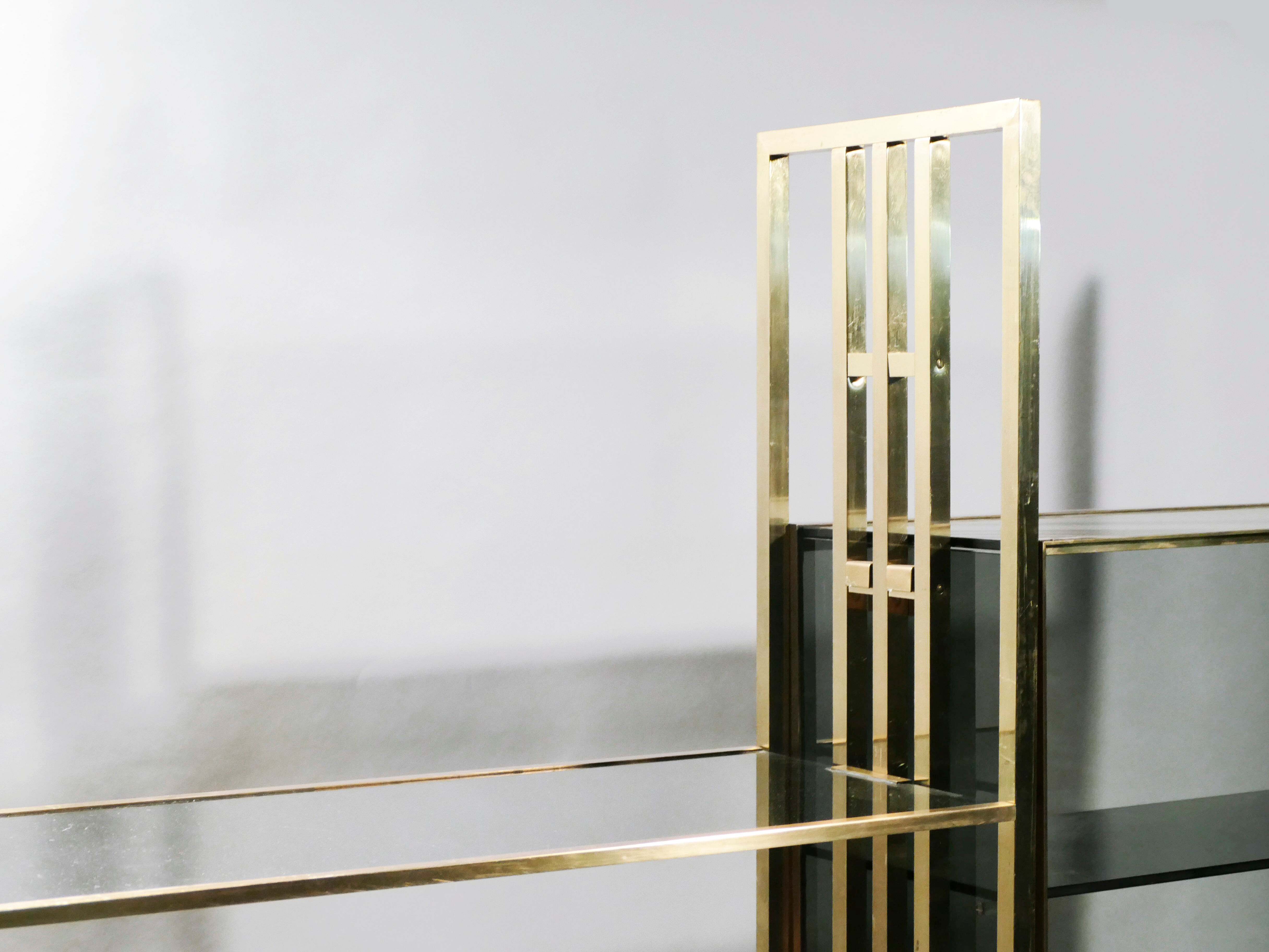Brass laced library shelf by Kim Moltzer 1970
