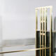 Brass laced library shelf by Kim Moltzer 1970
