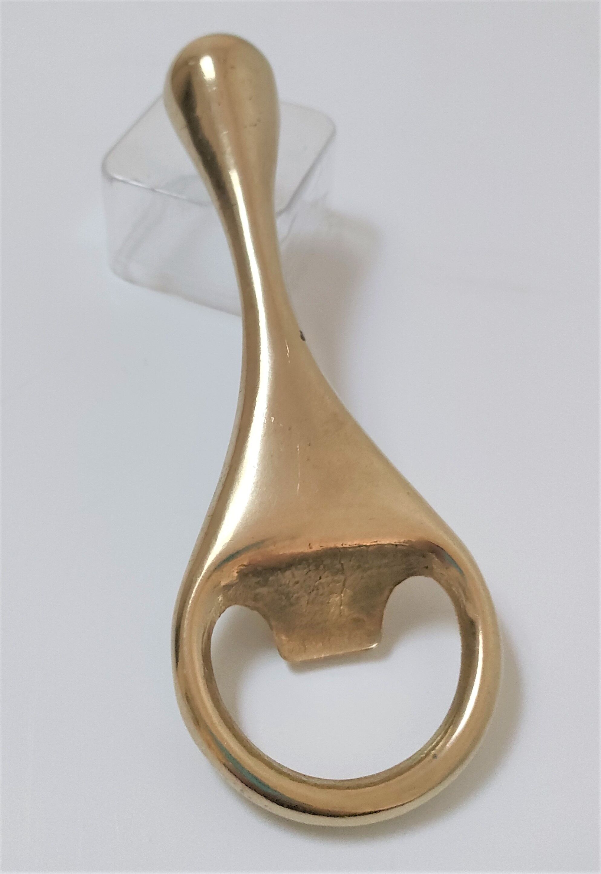 Modernist solid brass bottle opener by Carl Auböck