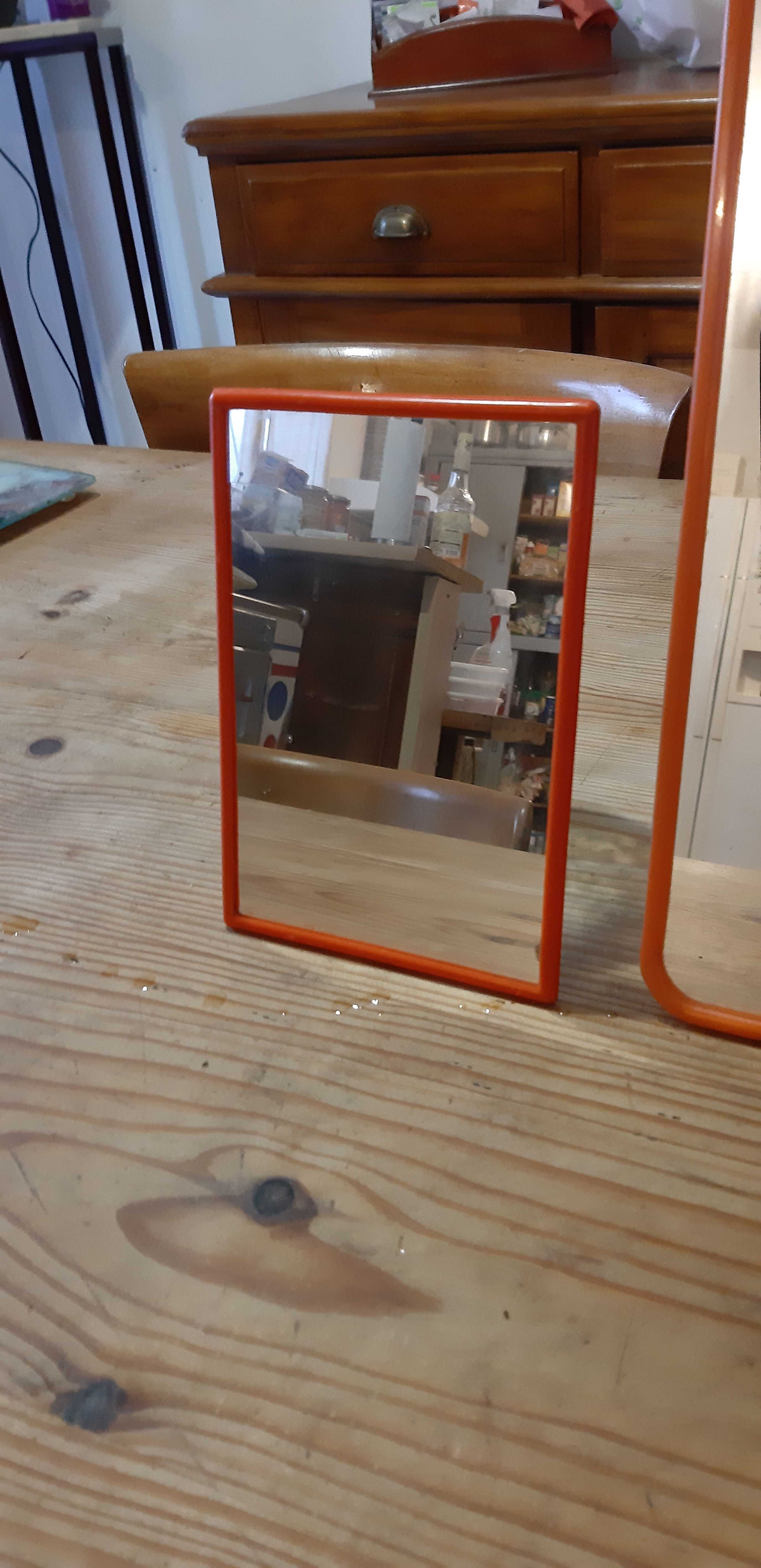 2 vintage plastic orange mirrors