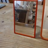 2 vintage plastic orange mirrors