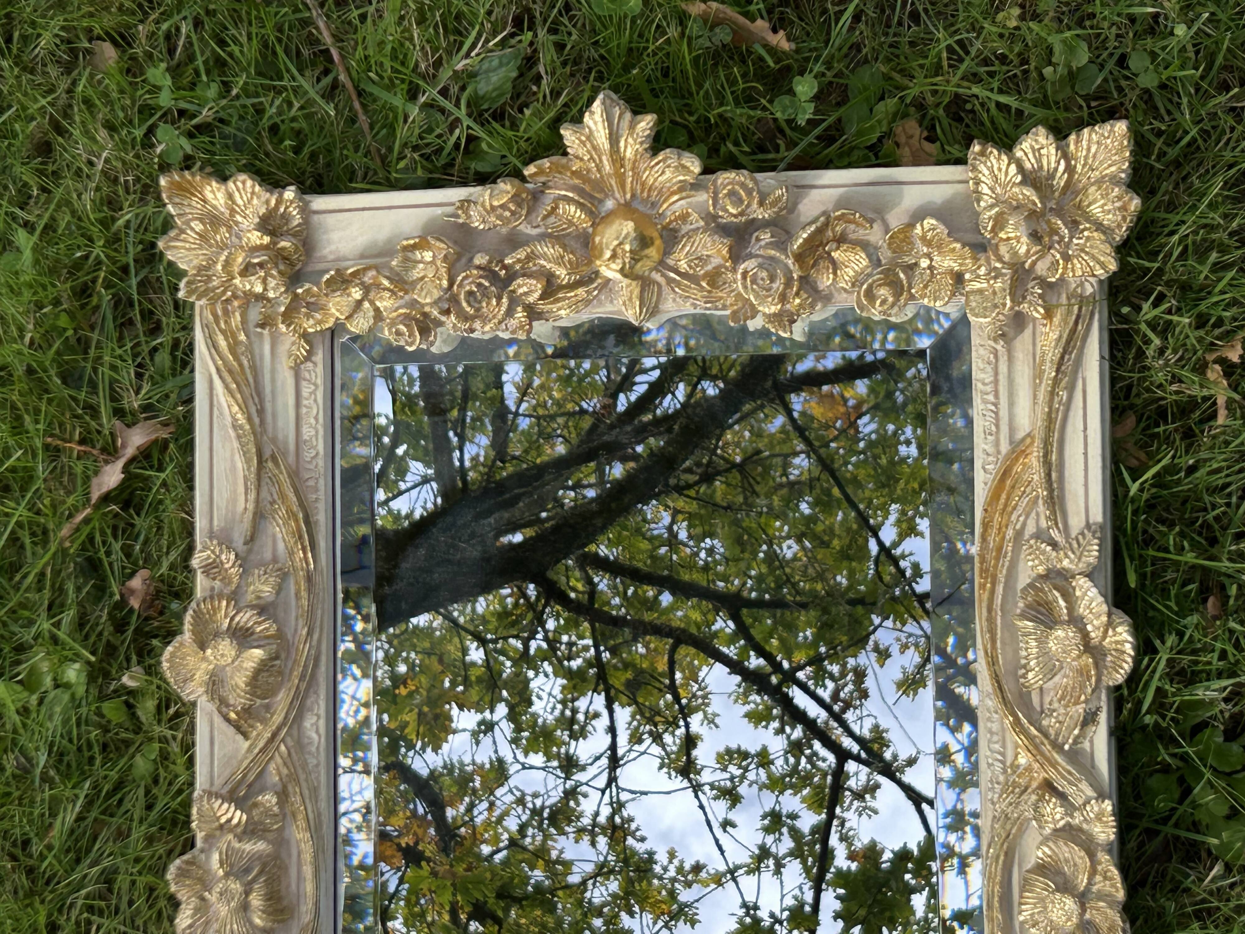 19th century style beveled mirror with garlands of flowers and leaves