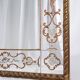 Miroir italien en verre églomisé, à parecloses, début XXe siècle